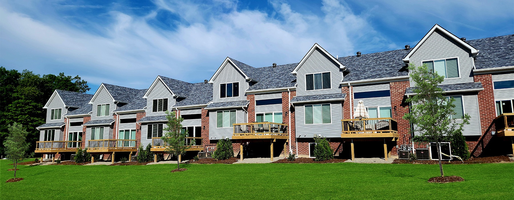 a row of houses with decks